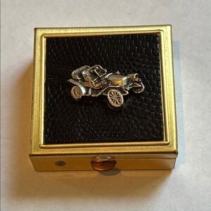 Vintage brass pill box with faux black leather and Ford Model T car metal charm